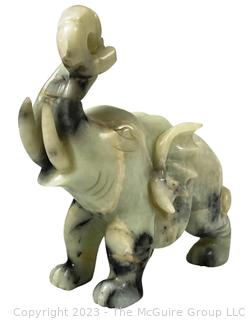 Carved Green Stone Elephant.  Small chip.  7" x 8".