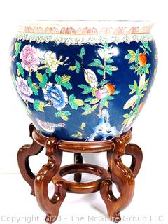 Chinese Hand Painted on Blue Ground Porcelain Koi Fish Bowl with Wood Stand. 20" tall with Stand and 14" diameter.