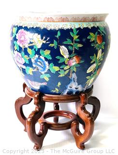 Chinese Hand Painted on Blue Ground Porcelain Koi Fish Bowl with Wood Stand. 20" tall with Stand and 14" diameter.