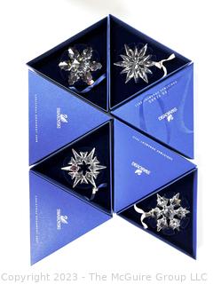 Four (4) Swarovski Snowflake Crystal Christmas Ornaments, New in Boxes. 2007, 2008, 2010 & 2011.