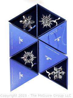 Four (4) Swarovski Snowflake Crystal Christmas Ornaments, New in Boxes. 2007, 2008, 2010 & 2011.