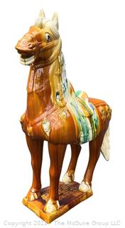 Large Chinese Tang Dynasty-Style Sancai Glazed Ceramic War Horse.  This is the first of two being offered in this auction.  36"