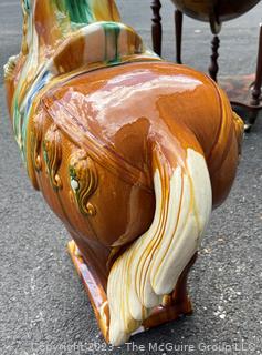 Large Chinese Tang Dynasty-Style Sancai Glazed Ceramic War Horse.  This is the first of two being offered in this auction.  36"