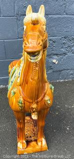 Large Chinese Tang Dynasty-Style Sancai Glazed Ceramic War Horse.  Chip in underside of base. This is the second of two being offered in this auction.  36" tall.  