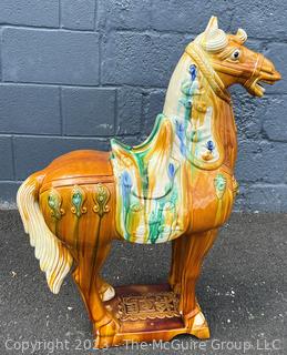 Large Chinese Tang Dynasty-Style Sancai Glazed Ceramic War Horse.  Chip in underside of base. This is the second of two being offered in this auction.  36" tall.  