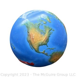 Large Painted Fiberglass World Globe with Hanging Wire.  Some dents and cracks. 47" diameter. 