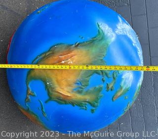 Large Painted Fiberglass World Globe with Hanging Wire.  Some dents and cracks. 47" diameter. 