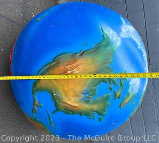 Large Painted Fiberglass World Globe with Hanging Wire.  Some dents and cracks. 47" diameter. 