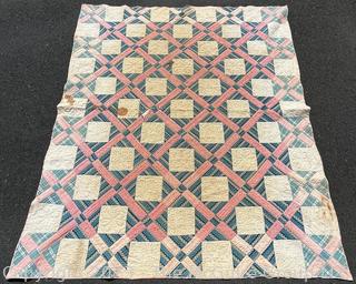 Vintage Hand Stitched Flour Sack Quilt in the Foundry Pattern. Some staining. Measures 86" x 72".