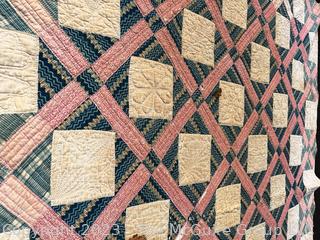 Vintage Hand Stitched Flour Sack Quilt in the Foundry Pattern. Some staining. Measures 86" x 72".