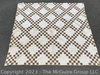 Vintage Hand Stitched Flour Sack Quilt in the  Double Irish Chain Pattern. Some staining. Measures 79" x 72".