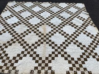 Vintage Hand Stitched Flour Sack Quilt in the  Double Irish Chain Pattern. Some staining. Measures 79" x 72".