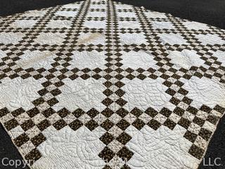 Vintage Hand Stitched Flour Sack Quilt in the  Double Irish Chain Pattern. Some staining. Measures 79" x 72".