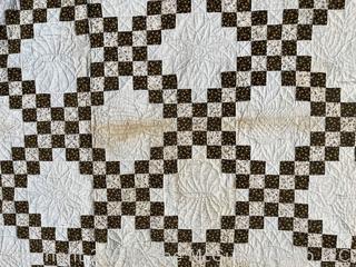 Vintage Hand Stitched Flour Sack Quilt in the  Double Irish Chain Pattern. Some staining. Measures 79" x 72".