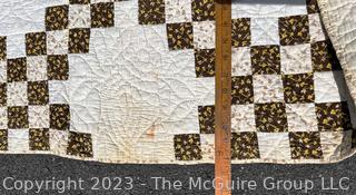 Vintage Hand Stitched Flour Sack Quilt in the  Double Irish Chain Pattern. Some staining. Measures 79" x 72".