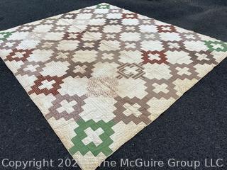 Vintage Hand Stitched Flour Sack Quilt in the Chimney Sweep Pattern. Some staining. Measures 79" x 72".