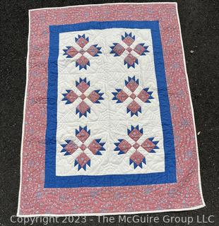 Small Babys Quilt in Pink and Blue made by Quilts Unlimited,  40" x 53".