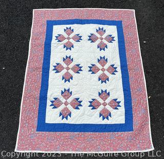 Small Babys Quilt in Pink and Blue made by Quilts Unlimited,  40" x 53".