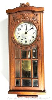 Vedette Wall Clock In Oak Case With 9 Beveled Glass Door, France.  Needs repair. 7" x 12" x 30"