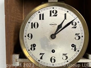 Vedette Wall Clock In Oak Case With 9 Beveled Glass Door, France.  Needs repair. 7" x 12" x 30"