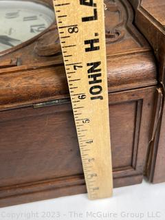 Vedette Wall Clock In Oak Case With 9 Beveled Glass Door, France.  Needs repair. 7" x 12" x 30"