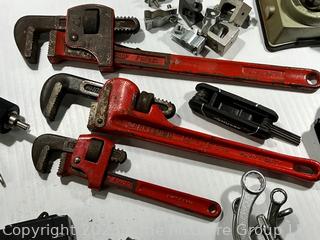 Group of Tools Including Pipe Wrenches and PanaVise 