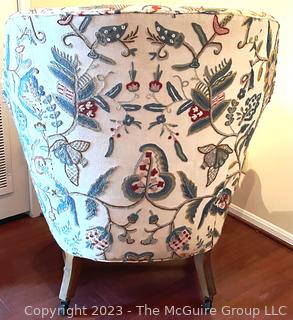 Queen Anne Wing Back Chair and Matching Ottoman Upholstered in Crewel Embroidery on White Ground.  