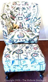 Queen Anne Wing Back Chair and Matching Ottoman Upholstered in Crewel Embroidery on White Ground.  