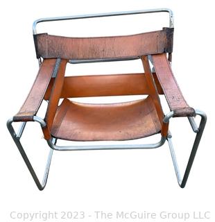 Marcel Breuer Wassily Style Leather Strap Chair.  Damaged. Straps need repair.   Measures 28w x 31d x 28.5"h