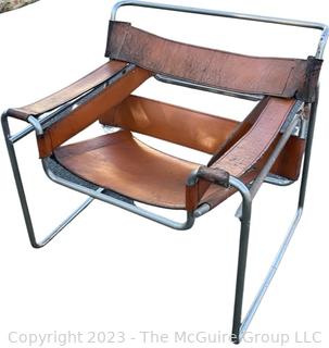 Marcel Breuer Wassily Style Leather Strap Chair.  Damaged. Straps need repair.   Measures 28w x 31d x 28.5"h