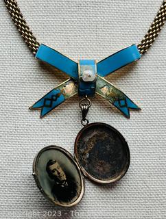 Antique Edwardian 18kt Gold Guilloche Enamel Locket with Art Deco Design and Ribbon Topper on Mesh Chain.   Marked Rosa Weil on Safety Clasp.  Some damage to enamel.  38.2 grams total weight