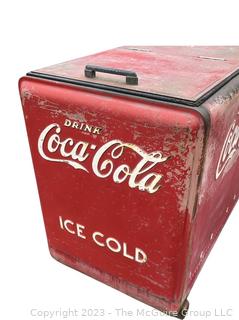 Drink Coca-Cola Large Flip Top Beverage Ice Box Cooler on Wheels.  Motor and compressor have been removed.  26" x 36" x 40"