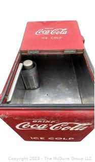 Drink Coca-Cola Large Flip Top Beverage Ice Box Cooler on Wheels.  Motor and compressor have been removed.  26" x 36" x 40"