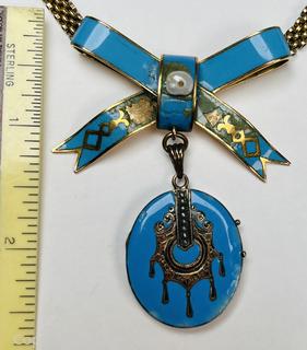 Antique Edwardian 18kt Gold Guilloche Enamel Locket with Art Deco Design and Ribbon Topper on Mesh Chain.   Marked Rosa Weil on Safety Clasp.  Some damage to enamel.  38.2 grams total weight