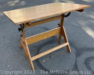 Oak Drafting Table with Adjustable Top. 42" x 31" x 33"