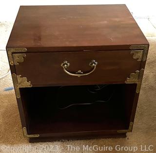 Henredon Campaign Style Walnut Nightstand.  First of Two Offered in the Auction. Measures 22w x 18d x 23"h