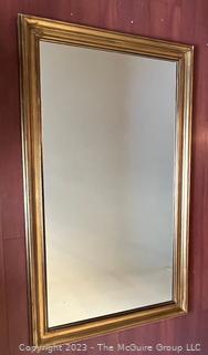 Large Gilt Framed Wall Mirror. Measures 36 x 61"