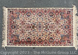 Machine Woven Wool Area Rug.  Measures 35 x 70"