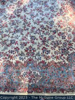 Karastan Kirman Wool Area Rug.  Some discoloration due to sun. Measures 11' x 14'