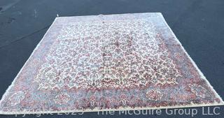 Karastan Kirman Wool Area Rug.  Some discoloration due to sun. Measures 11' x 14'