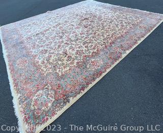 Karastan Kirman Wool Area Rug.  Some discoloration due to sun. Measures 11' x 14'