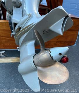 14' Restored 1952 Chris-Craft Classic Wooden Kit Runabout Boat With 1957 Mercury Mark 55E Outboard Motor And Mastercraft Trailer. According to consignor, "Winner of the Prestigious Best Outboard Boat Award at the 26th annual Antique and Classic Boat Society Chesapeake Bay Chapter Antique and Classic Boat Festival 2014. Originally assembled by Norman W. Bailey of Newmarket N.J., the boat has been renovated with expert craftsmanship and the finest materials and hardware available.  Stripped the the hull bare, replaced with Sepele Mahogany. All original wood sealed with CPES epoxy (inside and out) and joints secured with West Systems. Sikaflex adhesive sealant caulk on deck to match wood color. 3 coats of Pettit - Bikini Blue on hull and 7 coats of Z-Spar on deck. Matching exterior grade latex paint on hull interior to help wood breath and dampness evaporate. Flush cleats and electrical switching by Attwood and Cole Hersee Co.-U.S.A.. (see more below)