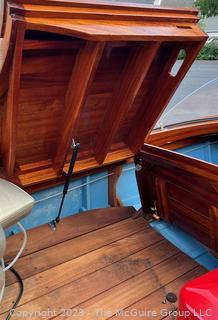 14' Restored 1952 Chris-Craft Classic Wooden Kit Runabout Boat With 1957 Mercury Mark 55E Outboard Motor And Mastercraft Trailer. According to consignor, "Winner of the Prestigious Best Outboard Boat Award at the 26th annual Antique and Classic Boat Society Chesapeake Bay Chapter Antique and Classic Boat Festival 2014. Originally assembled by Norman W. Bailey of Newmarket N.J., the boat has been renovated with expert craftsmanship and the finest materials and hardware available.  Stripped the the hull bare, replaced with Sepele Mahogany. All original wood sealed with CPES epoxy (inside and out) and joints secured with West Systems. Sikaflex adhesive sealant caulk on deck to match wood color. 3 coats of Pettit - Bikini Blue on hull and 7 coats of Z-Spar on deck. Matching exterior grade latex paint on hull interior to help wood breath and dampness evaporate. Flush cleats and electrical switching by Attwood and Cole Hersee Co.-U.S.A.. (see more below)