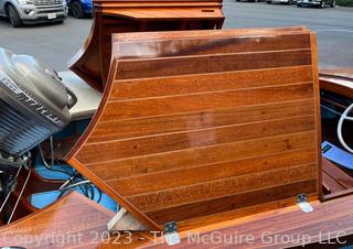 14' Restored 1952 Chris-Craft Classic Wooden Kit Runabout Boat With 1957 Mercury Mark 55E Outboard Motor And Mastercraft Trailer. According to consignor, "Winner of the Prestigious Best Outboard Boat Award at the 26th annual Antique and Classic Boat Society Chesapeake Bay Chapter Antique and Classic Boat Festival 2014. Originally assembled by Norman W. Bailey of Newmarket N.J., the boat has been renovated with expert craftsmanship and the finest materials and hardware available.  Stripped the the hull bare, replaced with Sepele Mahogany. All original wood sealed with CPES epoxy (inside and out) and joints secured with West Systems. Sikaflex adhesive sealant caulk on deck to match wood color. 3 coats of Pettit - Bikini Blue on hull and 7 coats of Z-Spar on deck. Matching exterior grade latex paint on hull interior to help wood breath and dampness evaporate. Flush cleats and electrical switching by Attwood and Cole Hersee Co.-U.S.A.. (see more below)