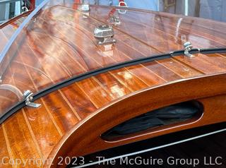 14' Restored 1952 Chris-Craft Classic Wooden Kit Runabout Boat With 1957 Mercury Mark 55E Outboard Motor And Mastercraft Trailer. According to consignor, "Winner of the Prestigious Best Outboard Boat Award at the 26th annual Antique and Classic Boat Society Chesapeake Bay Chapter Antique and Classic Boat Festival 2014. Originally assembled by Norman W. Bailey of Newmarket N.J., the boat has been renovated with expert craftsmanship and the finest materials and hardware available.  Stripped the the hull bare, replaced with Sepele Mahogany. All original wood sealed with CPES epoxy (inside and out) and joints secured with West Systems. Sikaflex adhesive sealant caulk on deck to match wood color. 3 coats of Pettit - Bikini Blue on hull and 7 coats of Z-Spar on deck. Matching exterior grade latex paint on hull interior to help wood breath and dampness evaporate. Flush cleats and electrical switching by Attwood and Cole Hersee Co.-U.S.A.. (see more below)