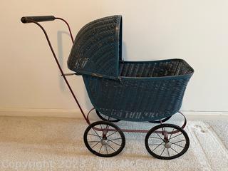 Antique Wicker Doll Buggy. Measures 21w x 11d x 22"h