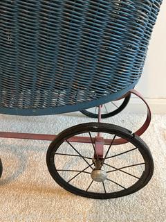 Antique Wicker Doll Buggy. Measures 21w x 11d x 22"h