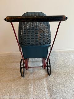 Antique Wicker Doll Buggy. Measures 21w x 11d x 22"h