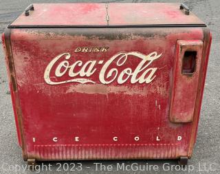 Drink Coca-Cola Large Flip Top Beverage Ice Box Cooler on Wheels.  Motor and compressor have been removed.  26" x 36" x 40"