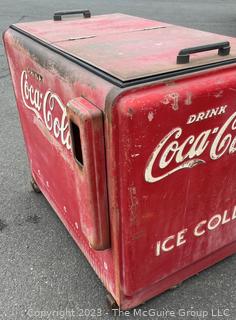 Drink Coca-Cola Large Flip Top Beverage Ice Box Cooler on Wheels.  Motor and compressor have been removed.  26" x 36" x 40"